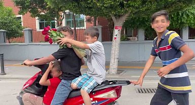 Adana'da 4 çocuğun elektrikli motosiklette tehlikeli yolculuğu: "Çek, her yerde paylaş"