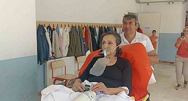Hastaneden oy kullanmak için oksijen tüpüyle geldi