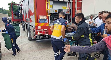 Yangında binada mahsur kalıp bayılan genç kızı itfaiye kurtardı