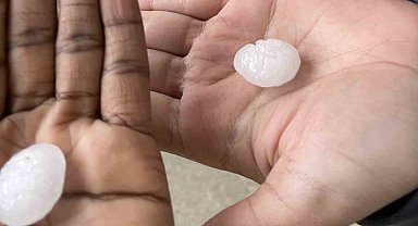 ABD'de dolu yağışı sokakları beyaza bürüdü