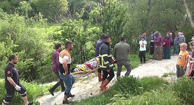 Çöp atmak isterken dereye düşen kadını itfaiye ekipleri kurtardı