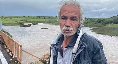 Eskişehir'de yıllardır akmayan dere sağanakla taştı, karayolu balçıkla kaplandı