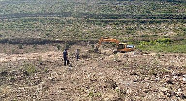 Hazine arazisinde yer açarken suçüstü yakalandılar