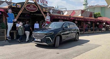 Togg'u teslim alıp kebapçıya gitti