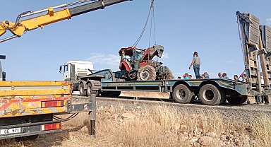 Uçuruma yuvarlanan traktör vinçle çıkartıldı