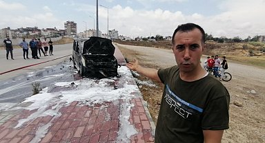 Yanan aracın sürücüsü canını zor kurtardı