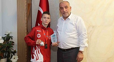 Başkan Sandıkçı'dan dünya şampiyonuna altın