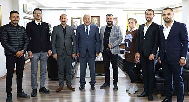 MHP'den Başkan Pekmezci'ye ziyaret