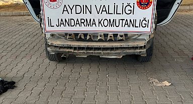 Otomobil tamponuna gizlenmiş, makineli tabanca ele geçirildi