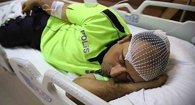 'Dur' ihtarına uymayan lüks araç trafik polisine çarpıp kaçtı