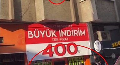 Pencere kenarına çıkan çocuğu, esnaf kurtardı