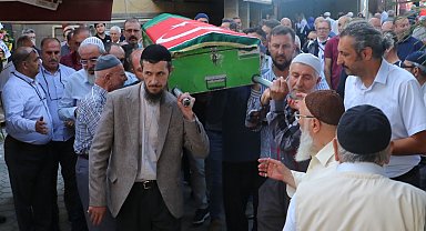 Porsuk Çayı'nda elleri iple bağlanmış halde cesedi bulunan profesör, toprağa verildi