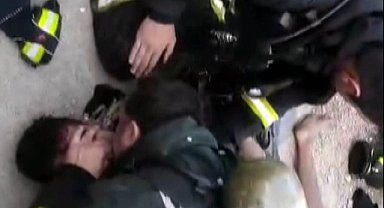 Yangında dumandan etkilenen kişi, itfaiye erinin suni teneffüsüyle hayata döndü