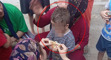 Çocuğuna işkence ettiği iddiasıyla gözaltına alındı, linçten polis kurtardı