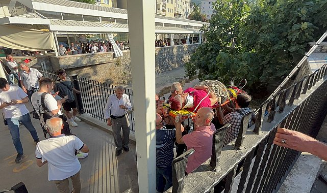 Dengesini kaybedip, 3 metre yükseklikten dereye düşen kadın yaralandı