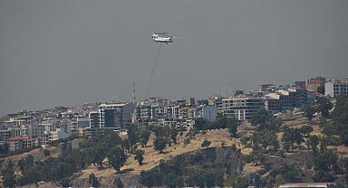 Karşıyaka'daki orman yangınına havadan müdahale; alevler Bayraklı'ya ulaştı