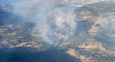 Karşıyaka'daki orman yangınına, havadan müdahale başladı
