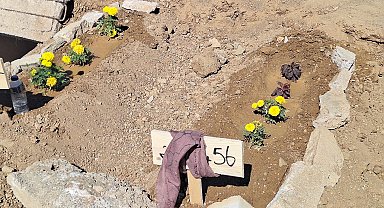 Katili eşiyle yan yana toprağa verildi