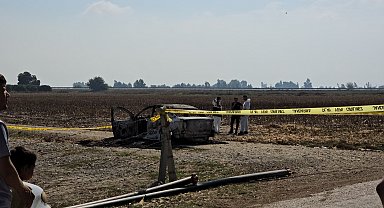 Yanan otomobilden ceset çıktı