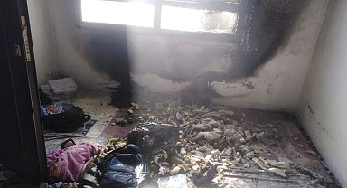 Evde çıkan yangında, 9 kişi dumandan etkilendi