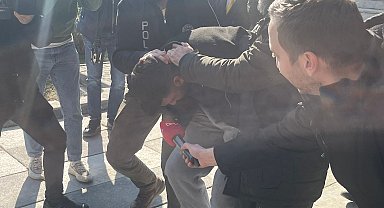 Kız arkadaşını dövüp, köpeğini tekmeleyen şüpheli adliyede