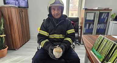 Su saatine sıkışan baykuşu itfaiye kurtardı