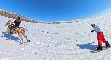 Yüzeyi buz tutan Çıldır Gölü'nde dörtnala snowboard