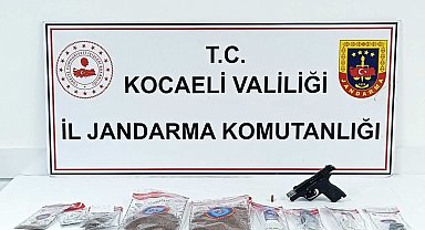 Evde 1 kilo uyuşturucu ve silah ele geçirildi