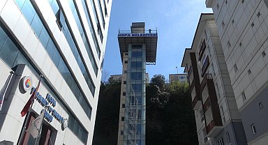 Sarp arazide kurulan 'asansör' ile evlerine ulaşıyorlar