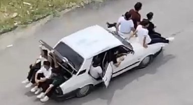 Otomobil bagajında ve kaputunda tehlikeli yolculuk kamerada