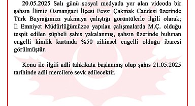 Türk bayrağını yakmaya çalıştığı öne sürülen şüpheli, kadın tepki gösterince kaçtı