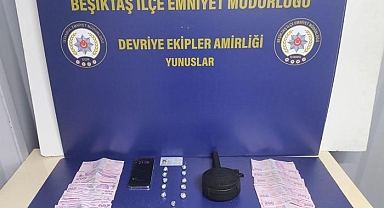 Beşiktaş'ta aracının gizli bölmesinde uyuşturucu ve şarjör bulunan zanlı tutuklandı